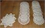 three sets of crochet doilies l