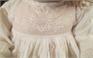 embroidery on the upper part of the gown ll